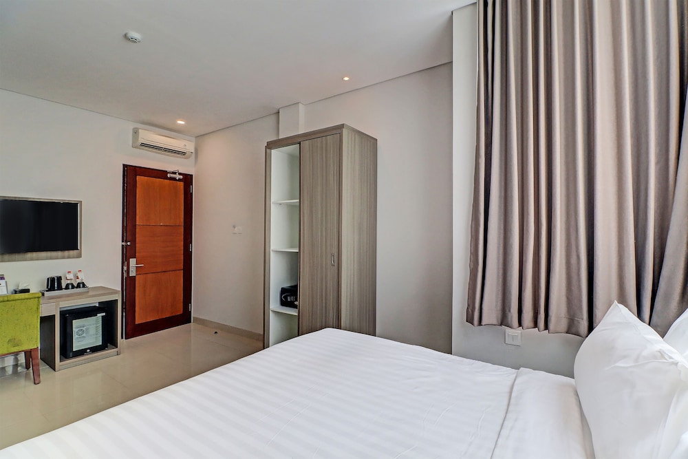 oyo townhouse oak series signature bali