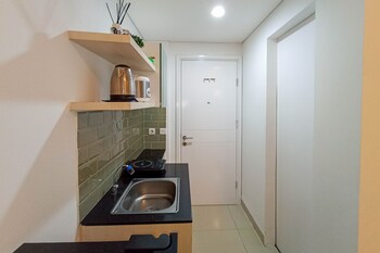 cozy studio at barsa city apartment