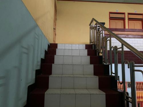 oyo 90770 wisma rima melati