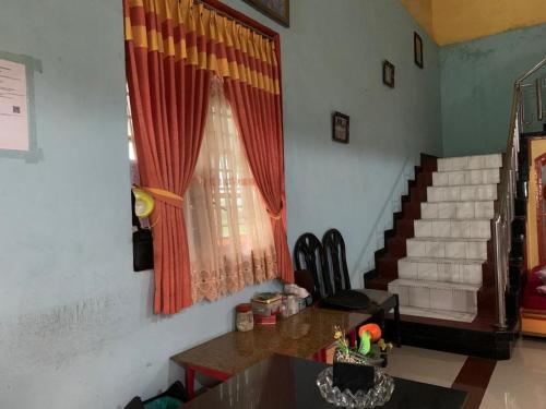 oyo 90770 wisma rima melati