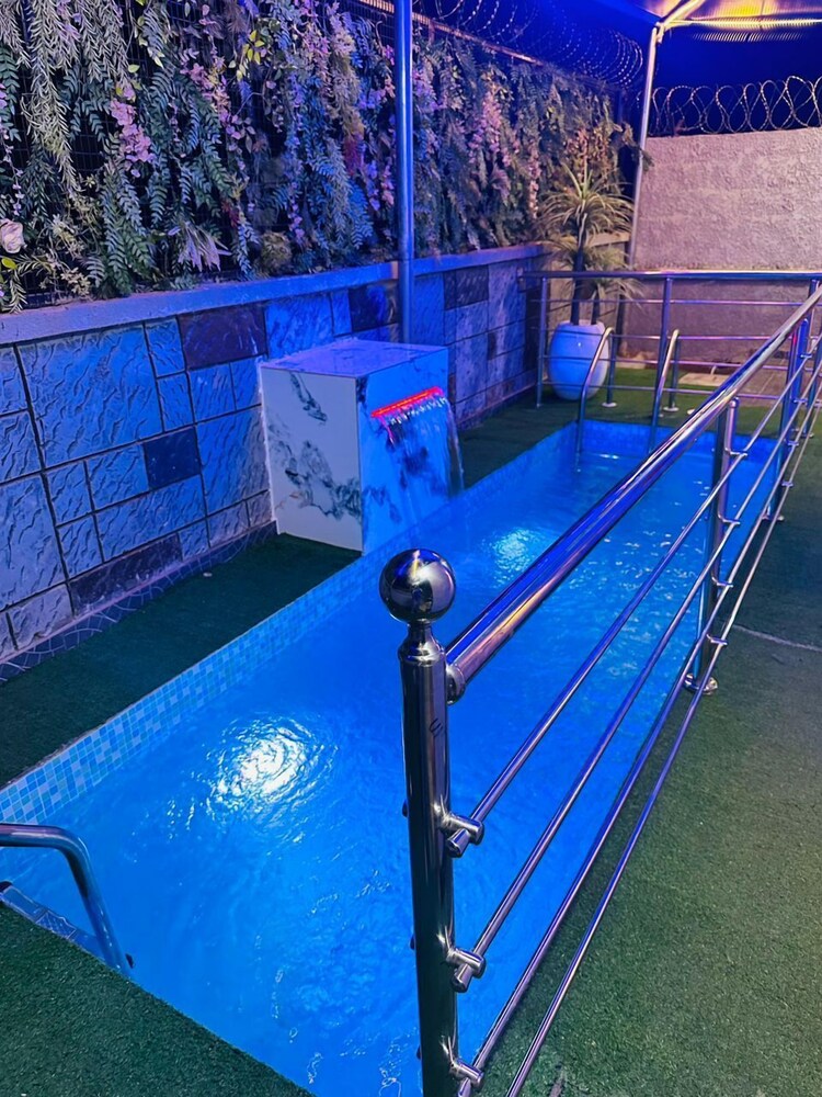 mini flat with starlink internet and pool