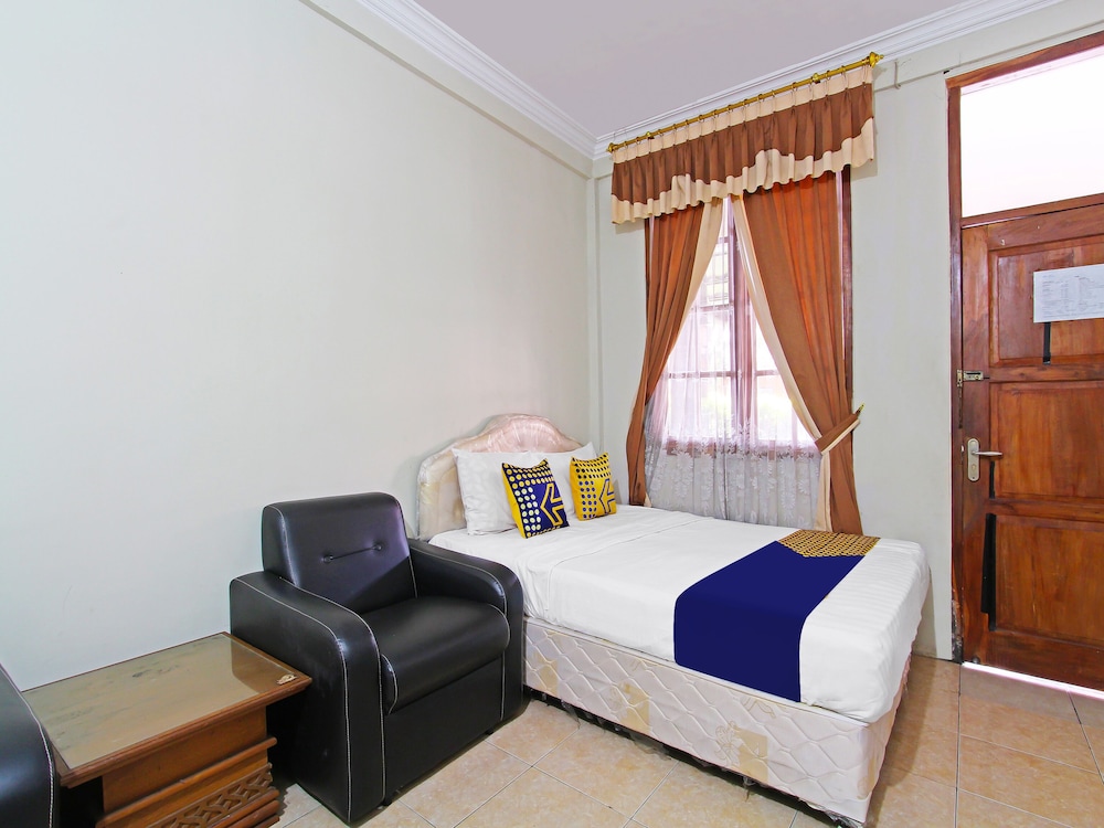 spot on 91563 hotel meilias