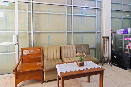 spot on 91563 hotel meilias