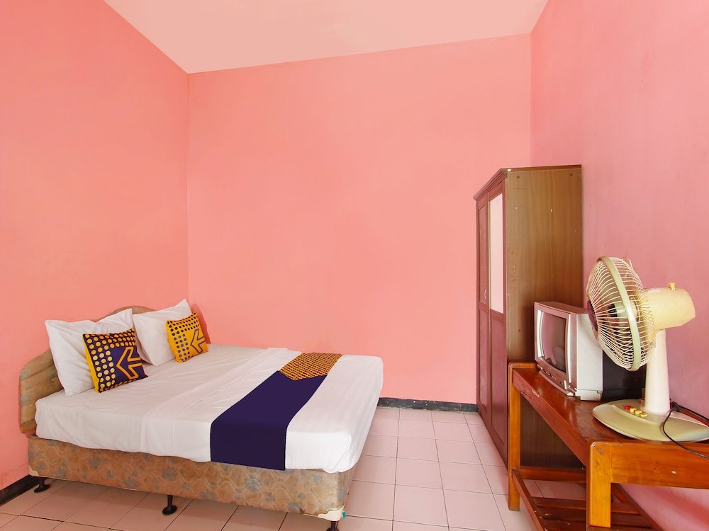 spot on 91563 hotel meilias