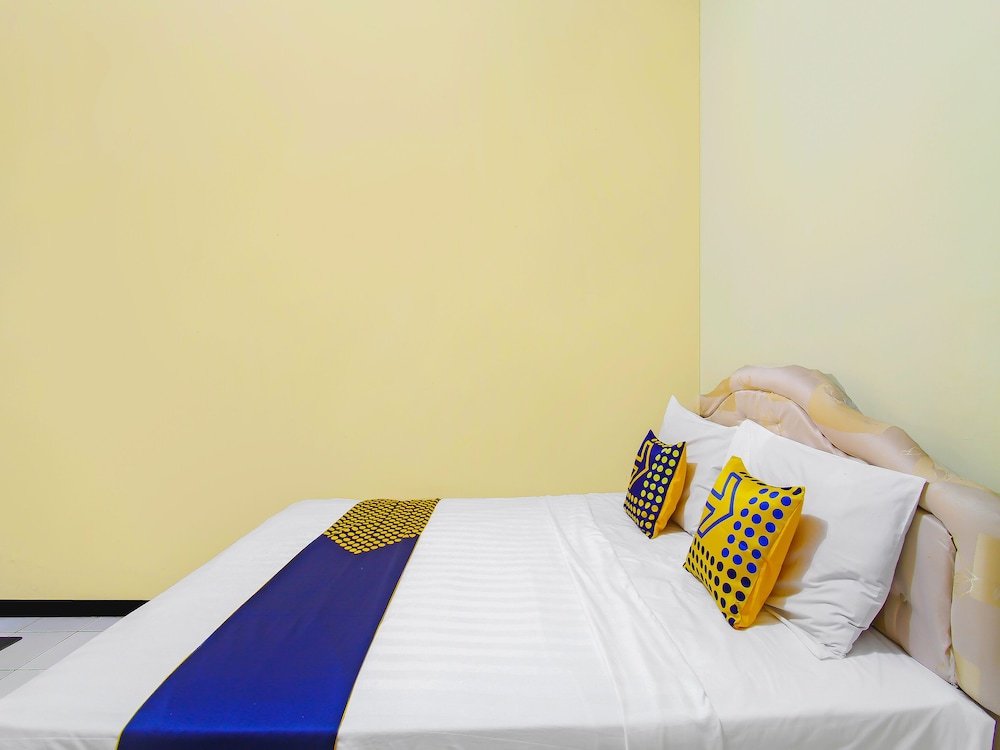 spot on 91563 hotel meilias