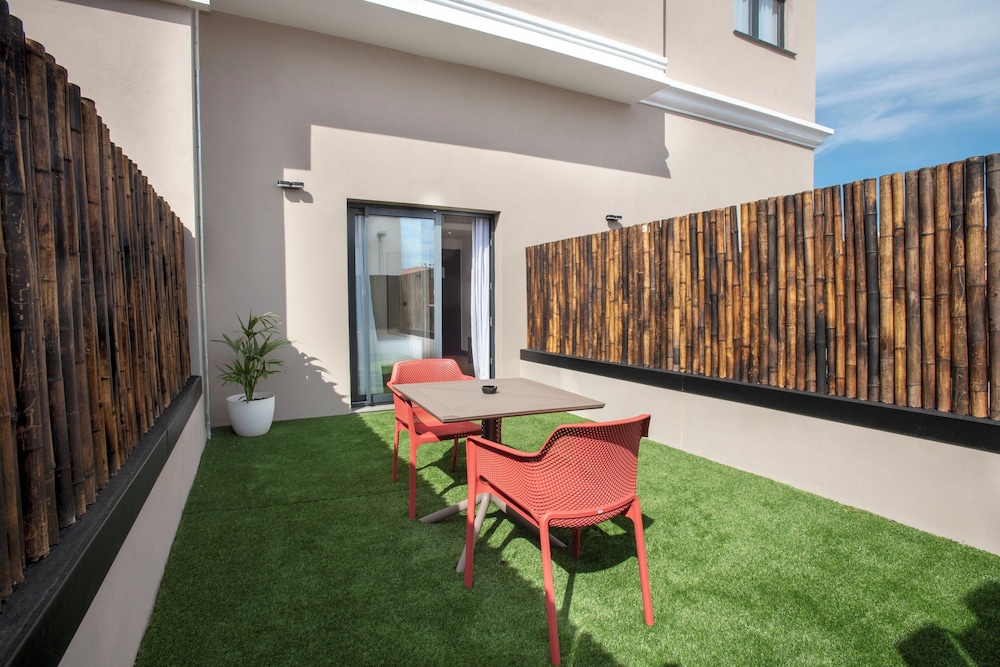 hotel sercotel plana suites