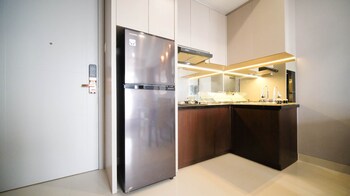 tidy and spacious 2br at grand sungkono lagoon apartment