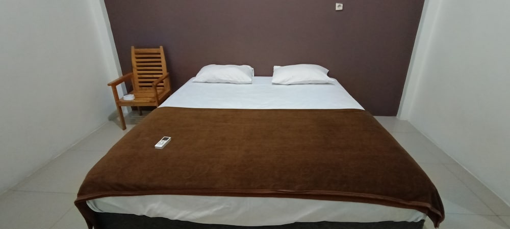 oyo 92243 fanilly guest house marabahan