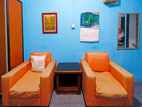 spot on 91591 rafika homestay syariah