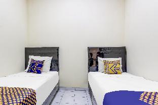 spot on 91374 asia stay semarang syariah