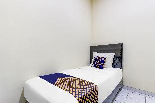 spot on 91374 asia stay semarang syariah