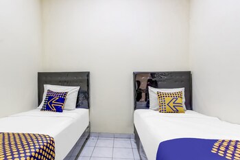 spot on 91374 asia stay semarang syariah