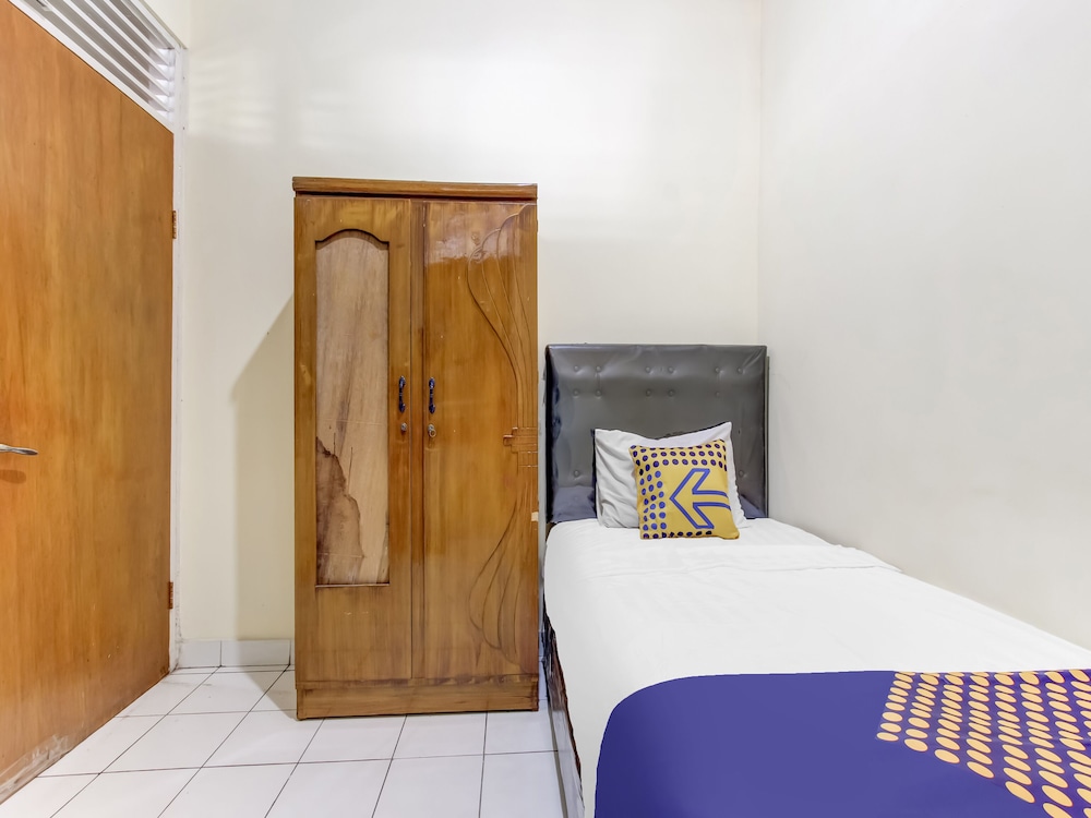 spot on 91374 asia stay semarang syariah