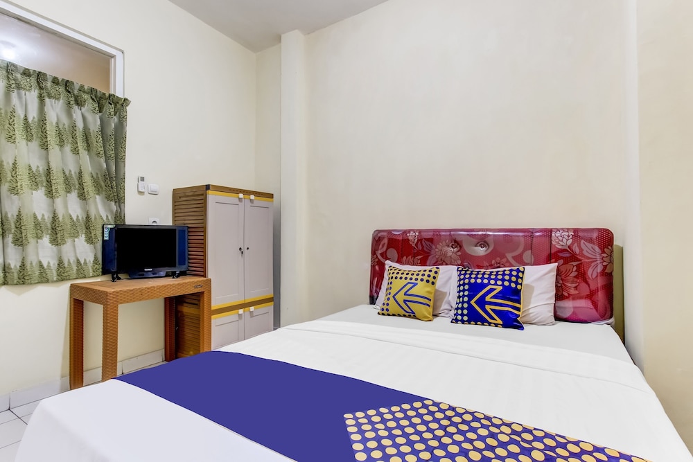 spot on 91374 asia stay semarang syariah