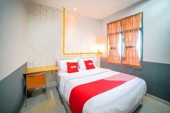 oyo 90874 millenium inn 2