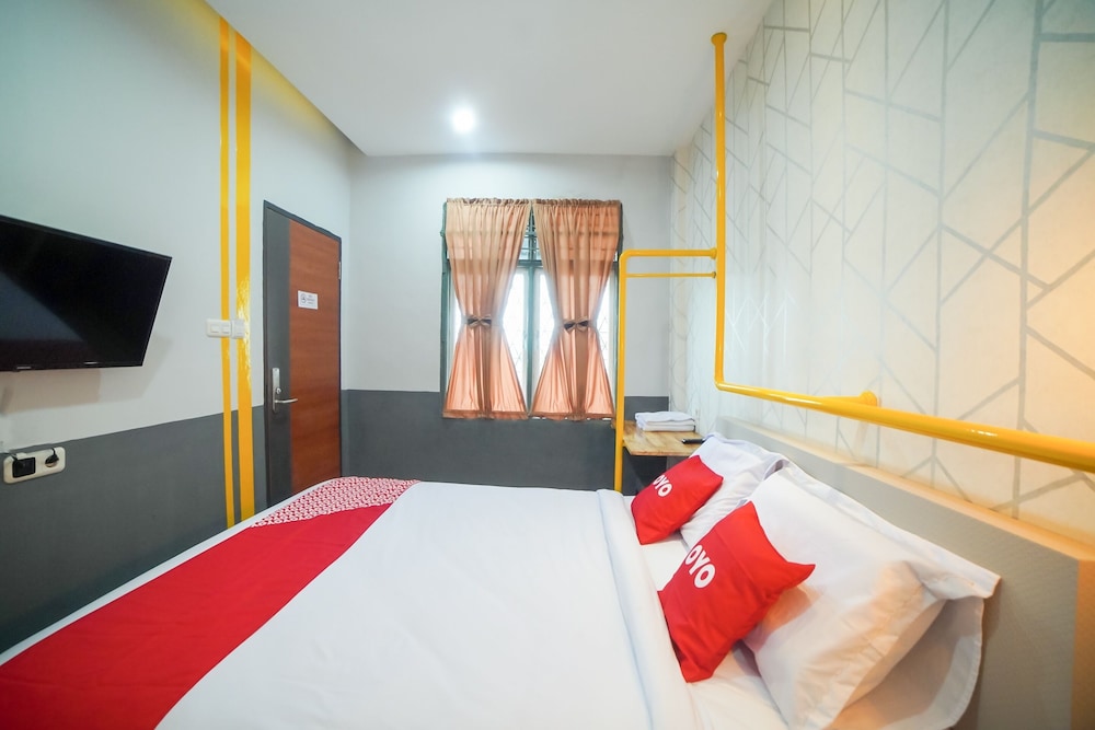 oyo 90874 millenium inn 2