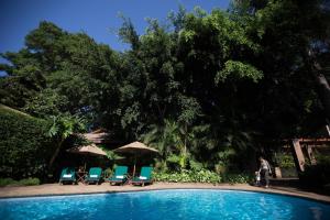 Elewana Arusha Coffee Lodge,Arusha National Park>>Arusha,4 star