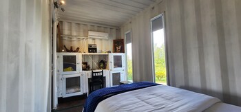 container and hobbit glamping
