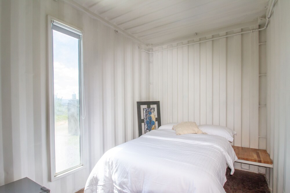 container and hobbit glamping