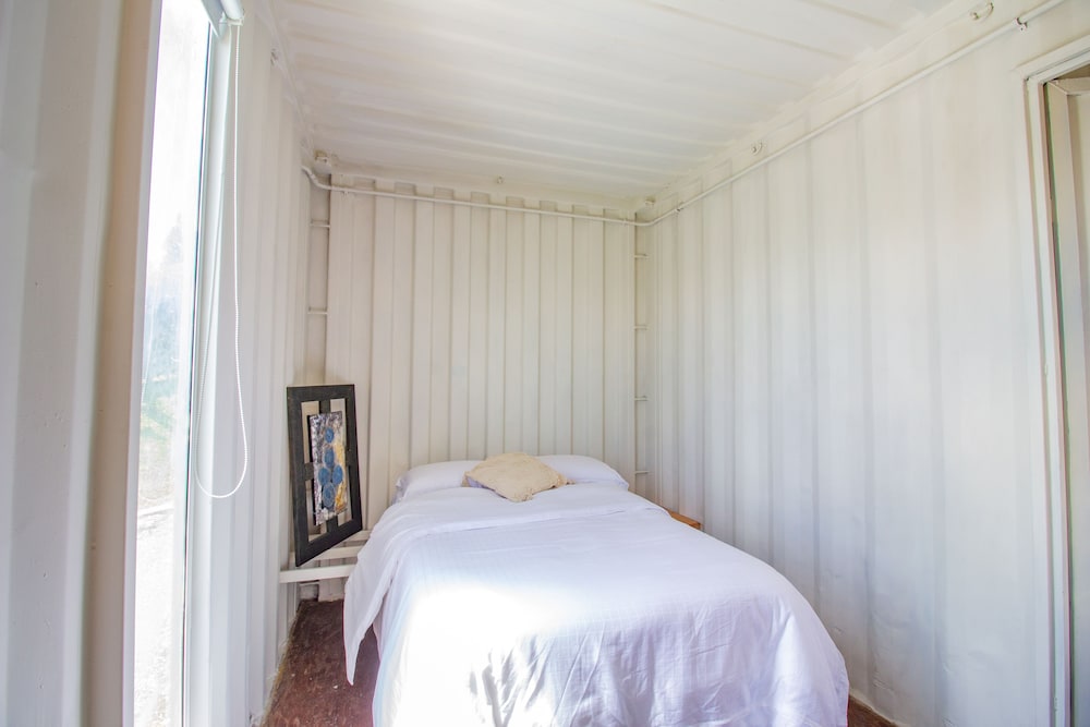 container and hobbit glamping