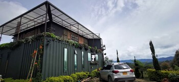 container and hobbit glamping