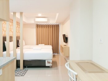 tranquil and comfort studio at de prima apartment