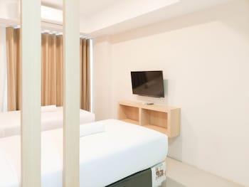 tranquil and comfort studio at de prima apartment