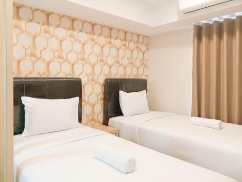 tranquil and comfort studio at de prima apartment