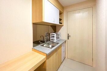 comfy studio room at de prima apartment medan apartment