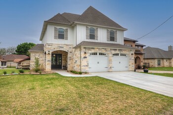 stunning luxury lake home with waterfront and dock