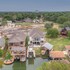 stunning luxury lake home with waterfront and dock