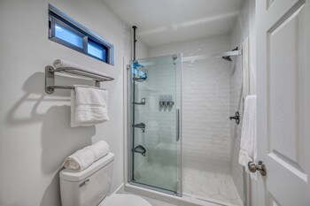 luxury riverfront villa with firepit and gameroom