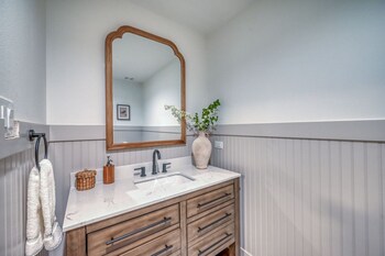 luxury riverfront villa with firepit and gameroom