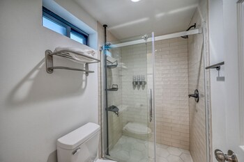 luxury riverfront villa with firepit and gameroom