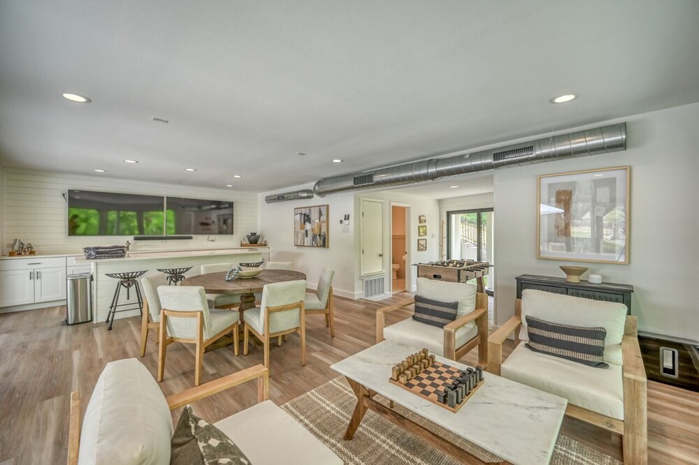 luxury riverfront villa with firepit and gameroom