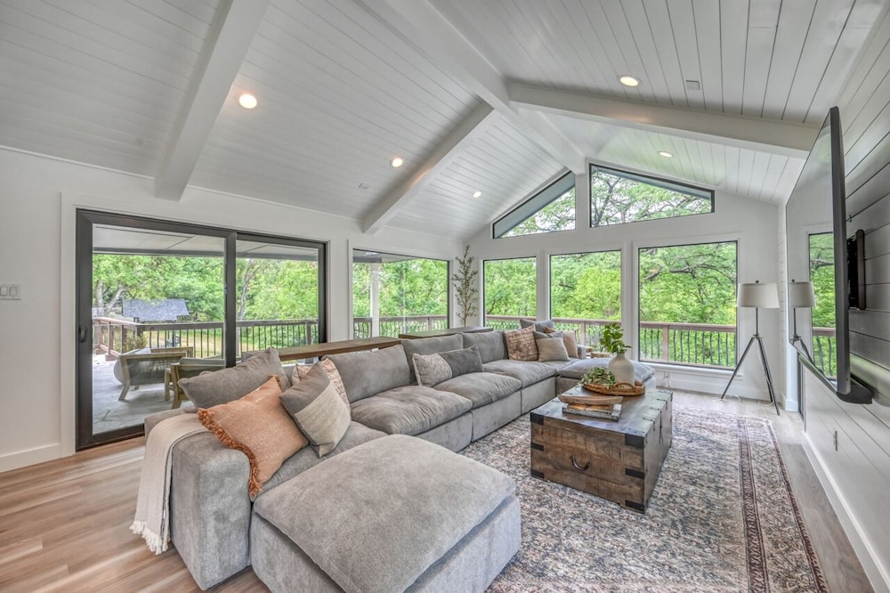 luxury riverfront villa with firepit and gameroom