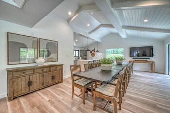 luxury riverfront villa with firepit and gameroom