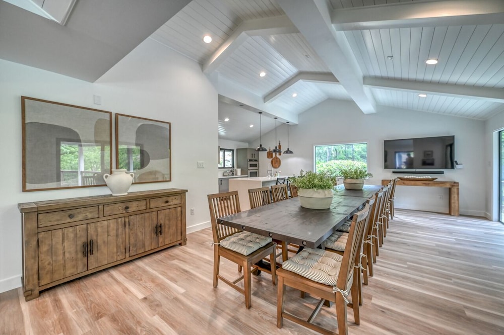 luxury riverfront villa with firepit and gameroom