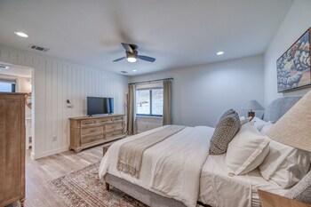 luxury riverfront villa with firepit and gameroom