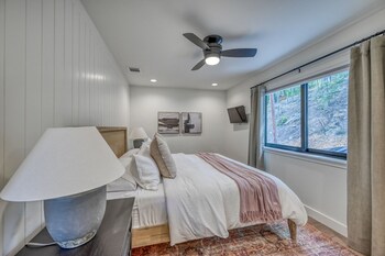 luxury riverfront villa with firepit and gameroom