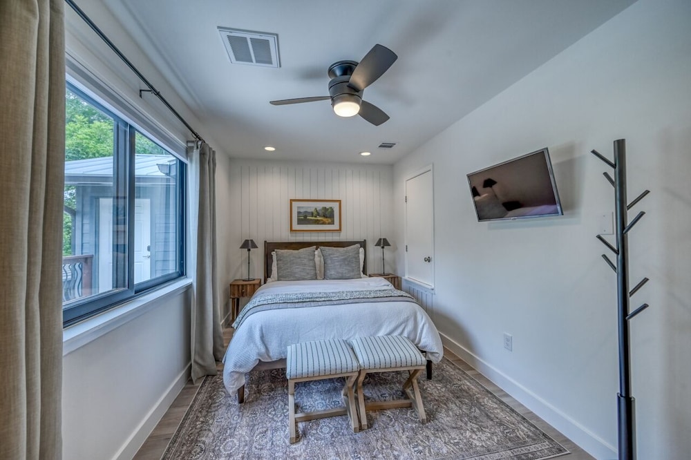 luxury riverfront villa with firepit and gameroom