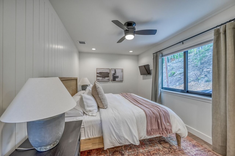 luxury riverfront villa with firepit and gameroom