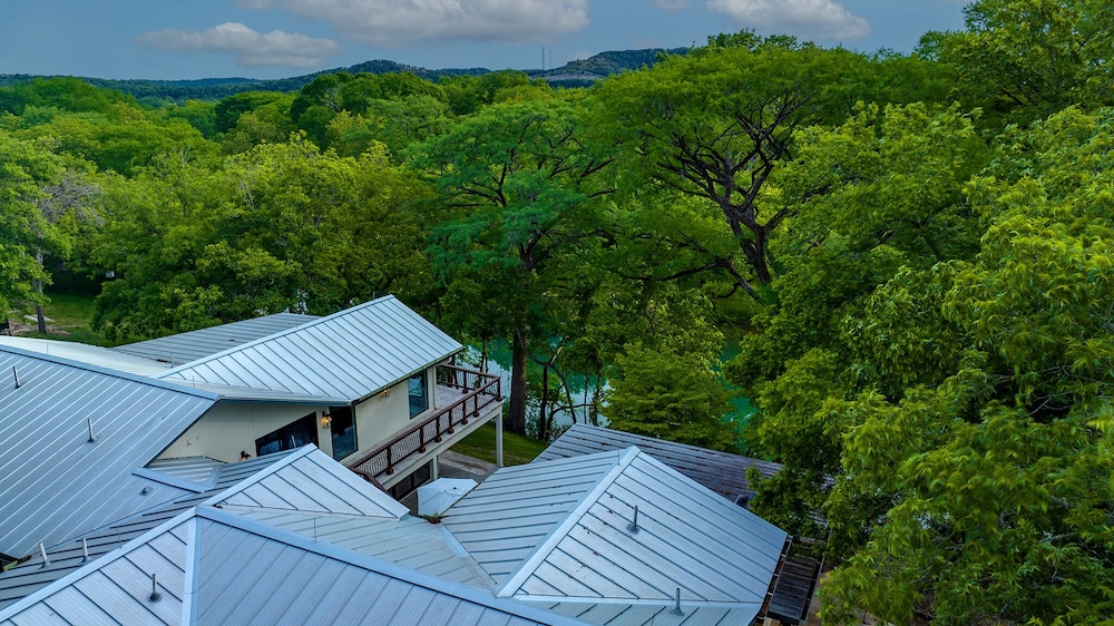 luxury riverfront villa with firepit and gameroom