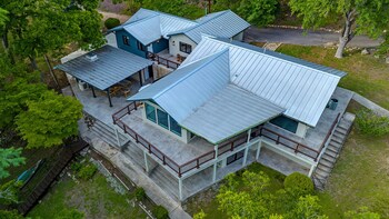 luxury riverfront villa with firepit and gameroom