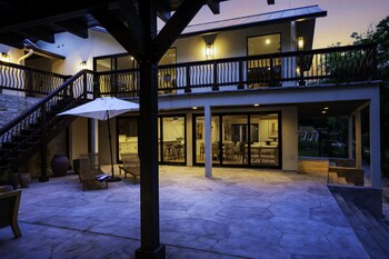 luxury riverfront villa with firepit and gameroom