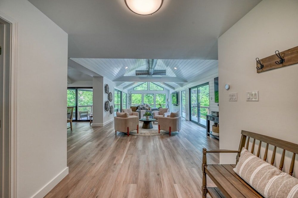 luxury riverfront villa with firepit and gameroom