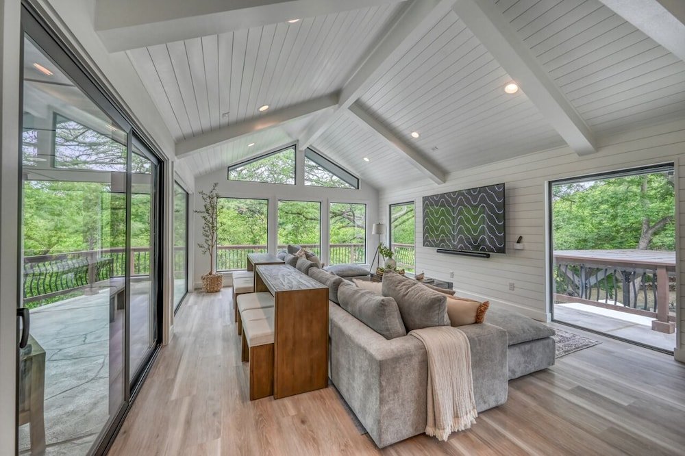 luxury riverfront villa with firepit and gameroom