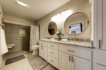 waterfront lake house with hot tub and firepit