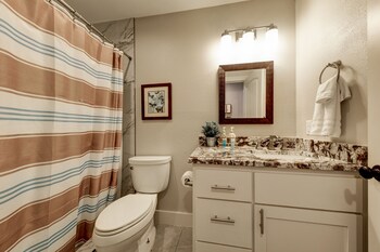 waterfront lake house with hot tub and firepit