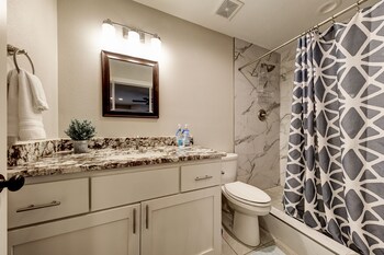 waterfront lake house with hot tub and firepit